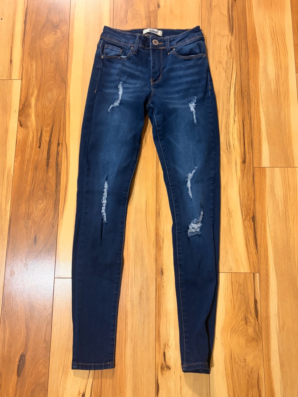 Classic Dark Blue Skinny Jeans with Distressed Detailing